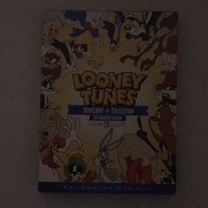 DVD OF LOONEY TUNES SIZES 2 ARE 3 INCH’S TALL